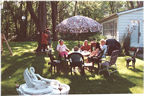 Virg and the Marandolas relax in Cheryl's backyard