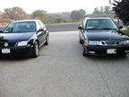 Side by side - both have alarms, Sunroofs and great rim wheels
